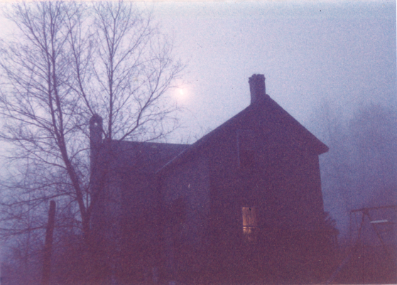picture of house by moonlight
